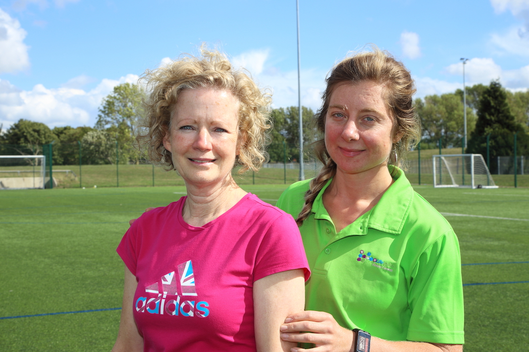 Mrs Darbyshire and Miss Norman on the sports field outside Liverpool Aquatics Centre, Wavertree.